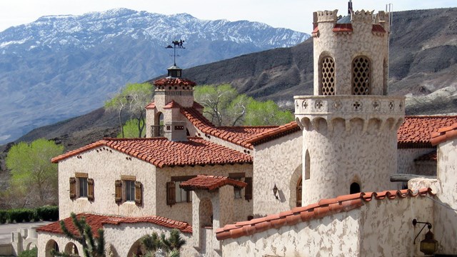 a spanish style villa in a desert setting