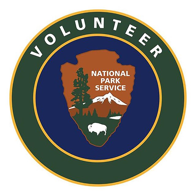 Volunteer logo for the National Park Service with arrowhead in the center.