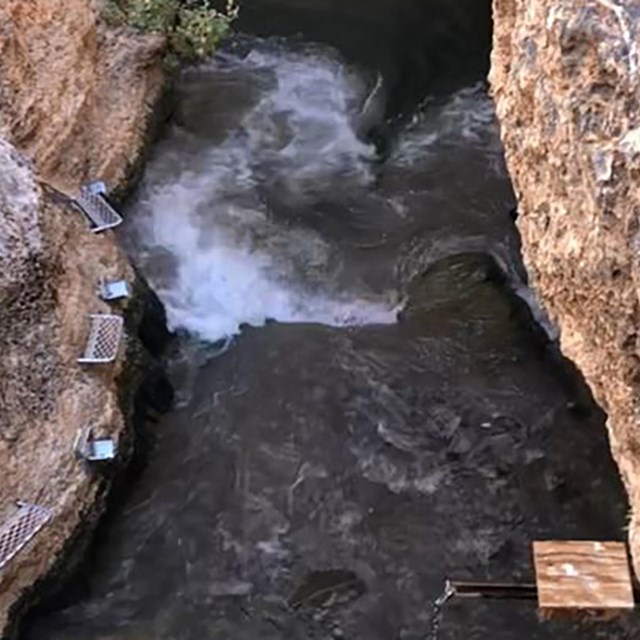 Video of waves crashing against rocky walls in Devils Hole.