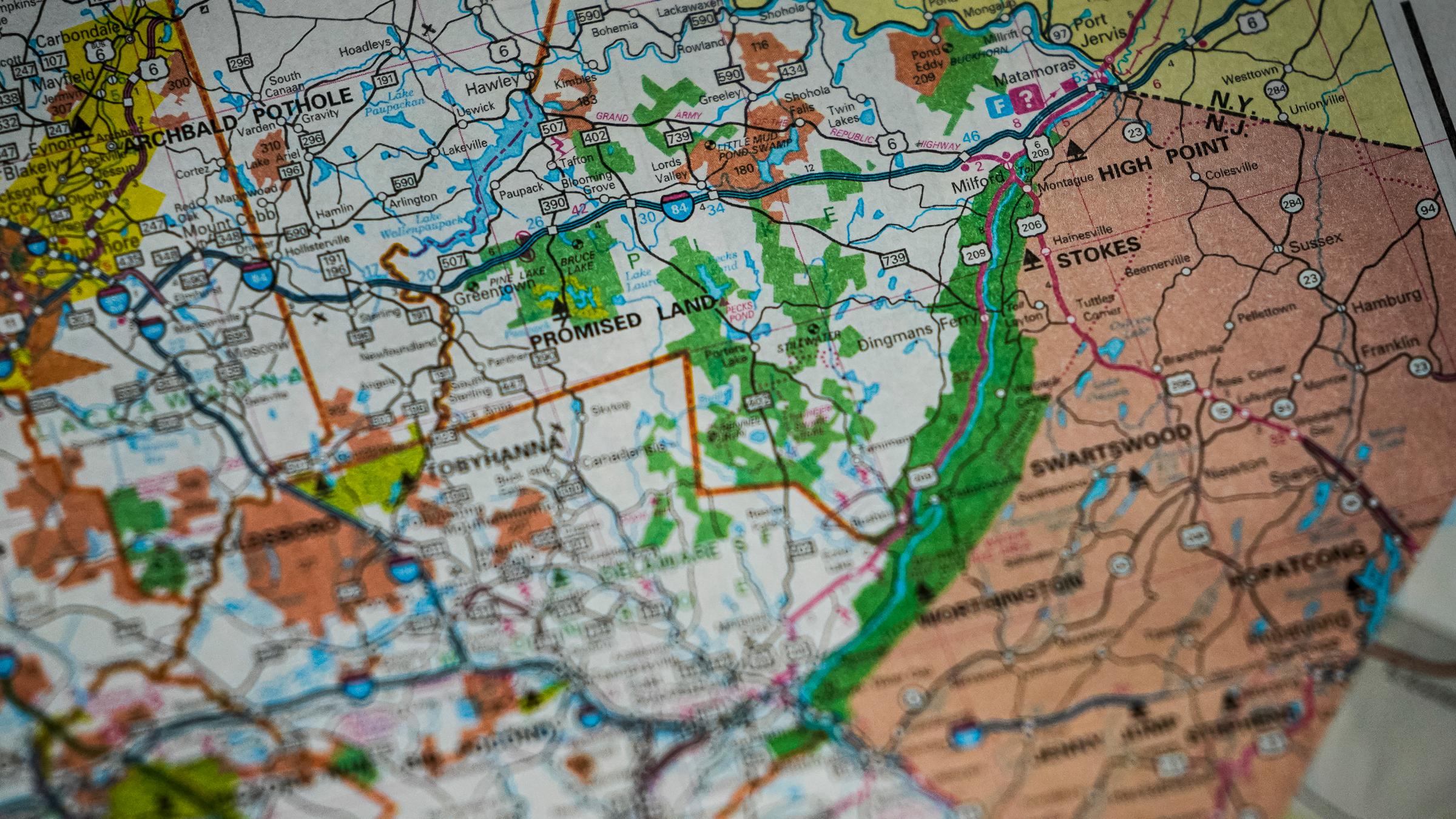 Picture of a standard road map with different colors signifying protected areas and towns. NPS Photo
