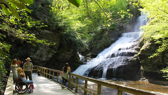 Visitors speak with a park ranger at Dingmans Falls