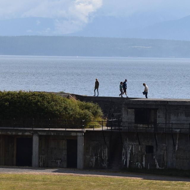 people explore the battlements at fort casey