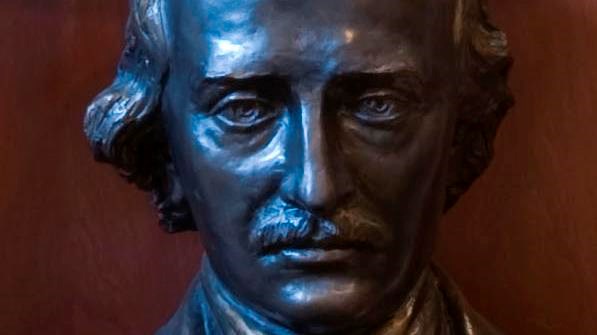 Color image of a detail of a bronze bust of Edgar Allan Poe.