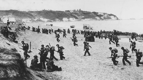 A black and white image of American soldiers landing in North Africa