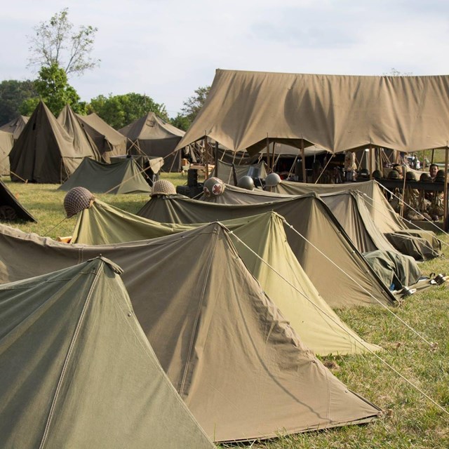 A row of green army tents