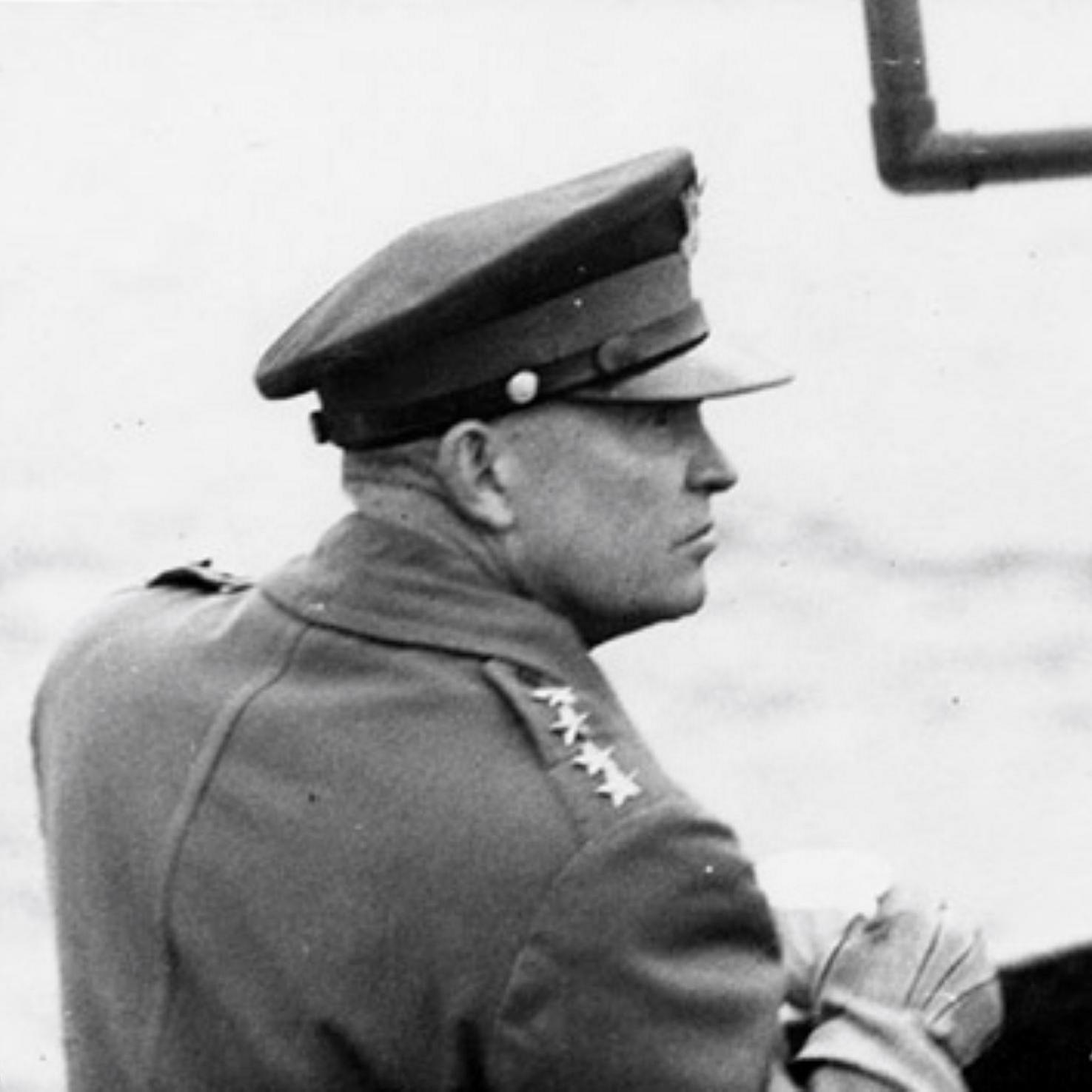 A black and white photo of Dwight Eisenhower on June 7, 1944