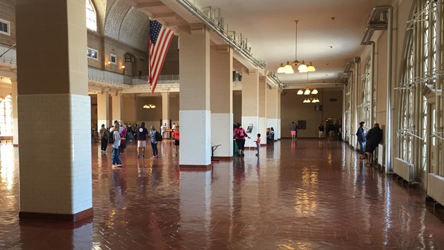 A view of the Great Hall on Ellis, large windows are on the right, tall columns are on the left