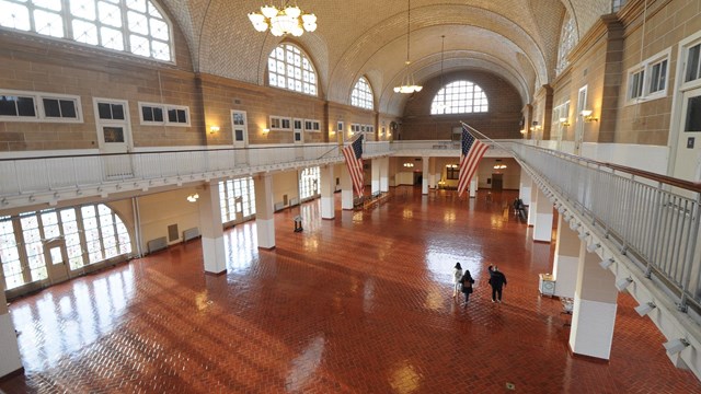 A view of the Registry Room on Ellis Island from the balcony.  