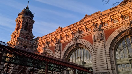 main immigration building at ellis island during daytime