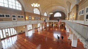 A view of the Registry Room on Ellis Island from the balcony.