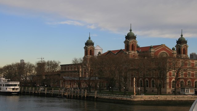 main immigration building at ellis island during daytime