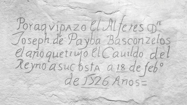 An inscription on a rock in archaic Spanish