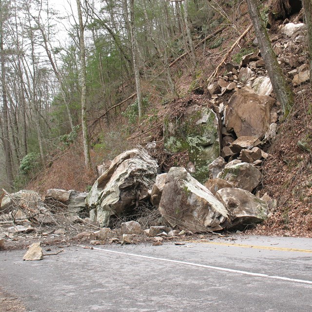rock slide deposit blocking a park road