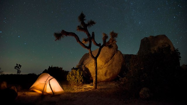 Glowing tent in Ryan Campground.