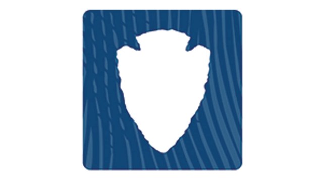 blue square with white arrowhead and blue text that reads National Park Foundation