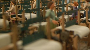 Model of women working in a mill