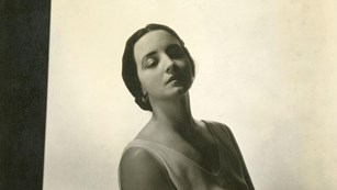 Black and white photograph of Carlotta Monterey O'Neill reclining slightly