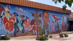wall mural with different paintings of mexican people