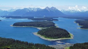 image of mountains, water and trees