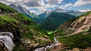 Road winding through a mountain range and valley
