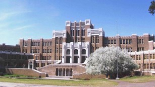 Large brick high school building