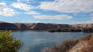 River running through a hilly area