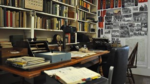 Desk by a bookshelf