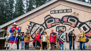 Huna tribal members in front of the Huna Tribal House