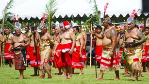 indigenous men with indigenous clothing