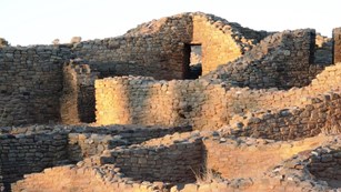 Pueblo ruins at sunset