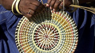 Closeup of colorful, round, woven basket