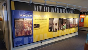 Roger Williams exhibit on long interior wall