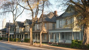 Row of two-story homes on a street