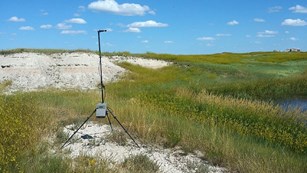Acoustic monitoring station in a grass prairie