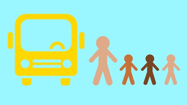 Multi-ethnic teacher and kids about to board a yellow school bus. 