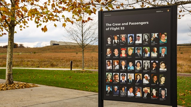 An informational sign at the memorial with photos of the crew and passengers of Flight 93
