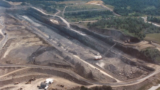 Image of open face coal mining.