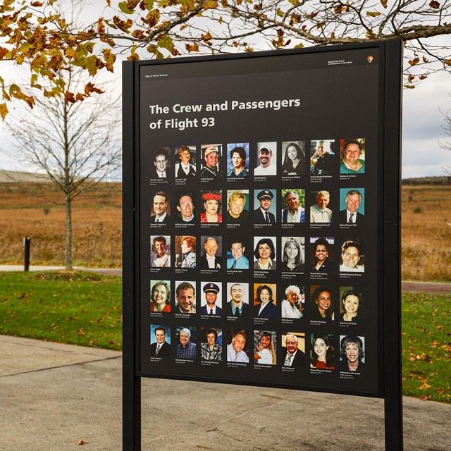 A informational sign at the memorial with photos of the crew and passengers of Flight 93