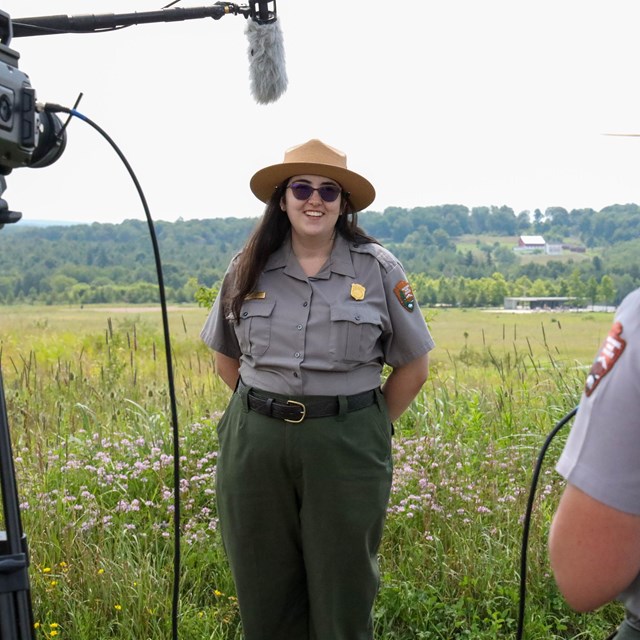 A park ranger being interviewed on camera