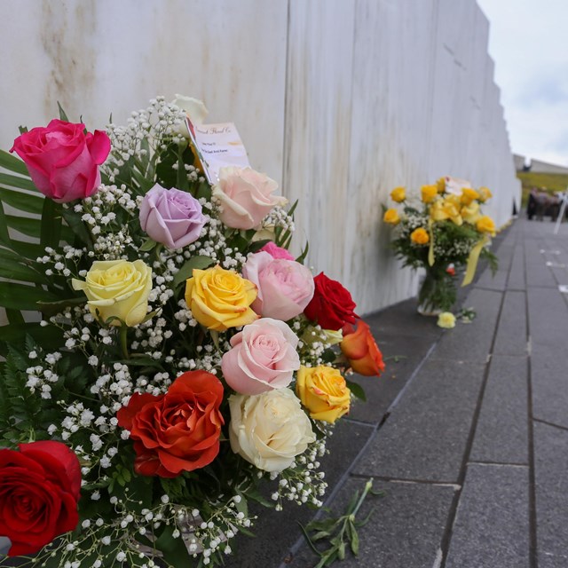 Flowers at the Wall of Names.