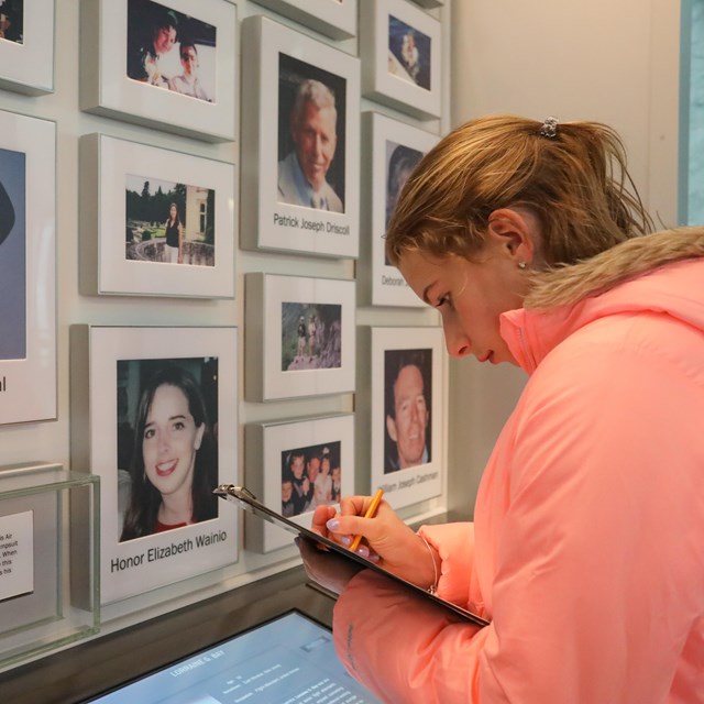 Student with clipboard researches passengers and crew.