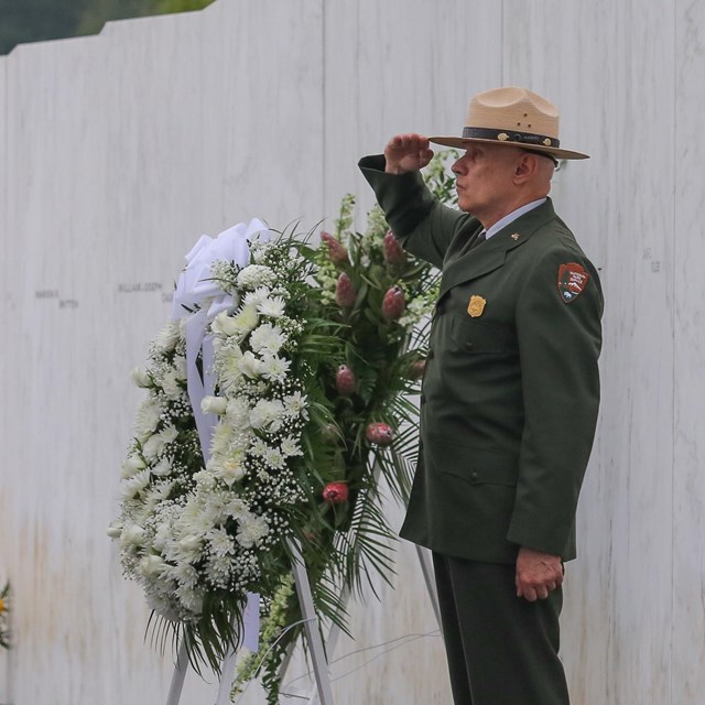 Ranger presenting a wreath.