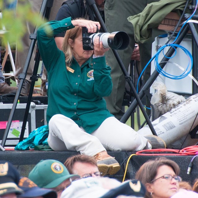 Photographer takes a picture.