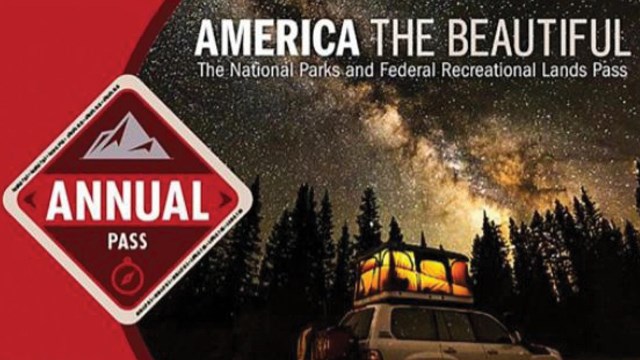 An America the Beautiful park pass showing a vehicle with a tent on top below the stars.