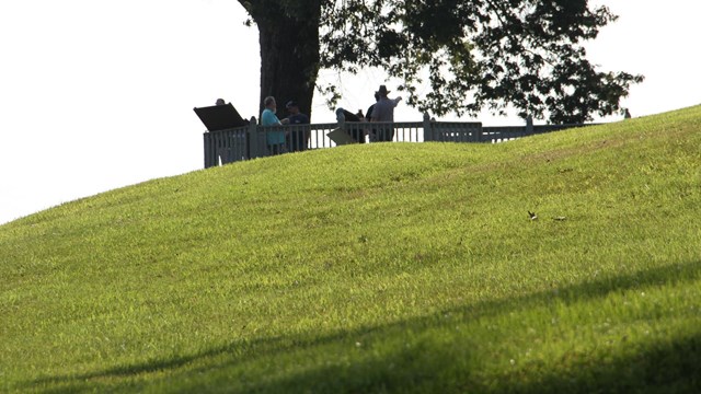 Photo of the river batteries and visitors on an overlook
