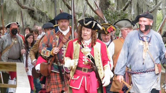 Soldiers marching on the boardwalk