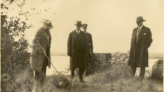 Image of President Coolidge and his staff 