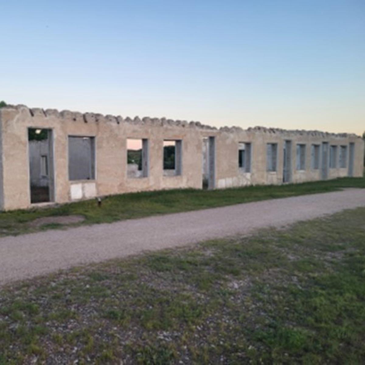 Adobe walls standing in formation. 