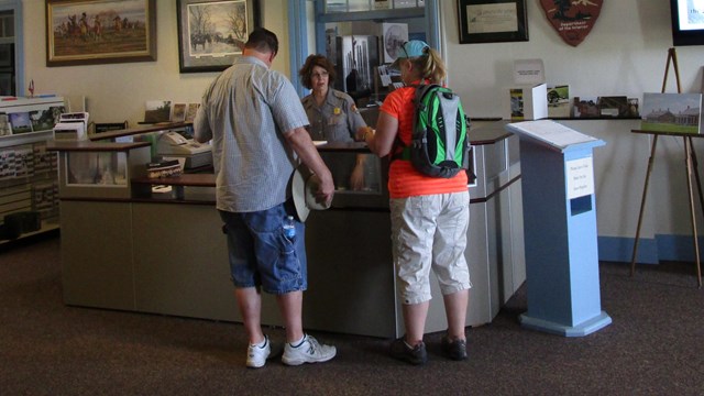Visitors at the Information Desk.