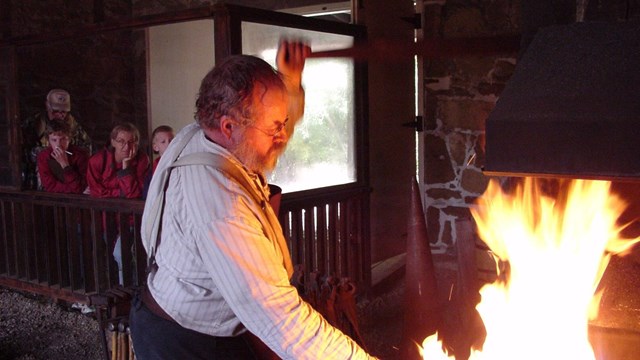 19th century blacksmith demonstration.